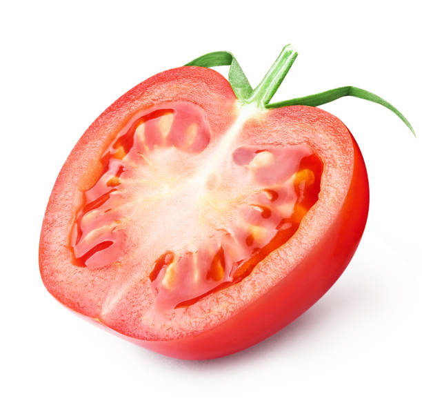 istock Single half of ripe tomato on white 1453157599