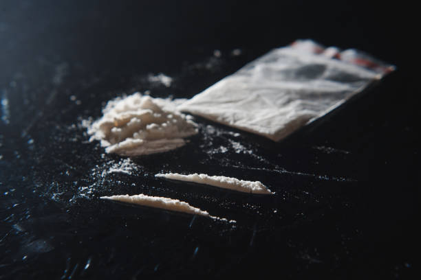 Hard drugs on black table. Close up. Hard drugs on black table. Close up cocaine stock pictures, royalty-free photos & images
