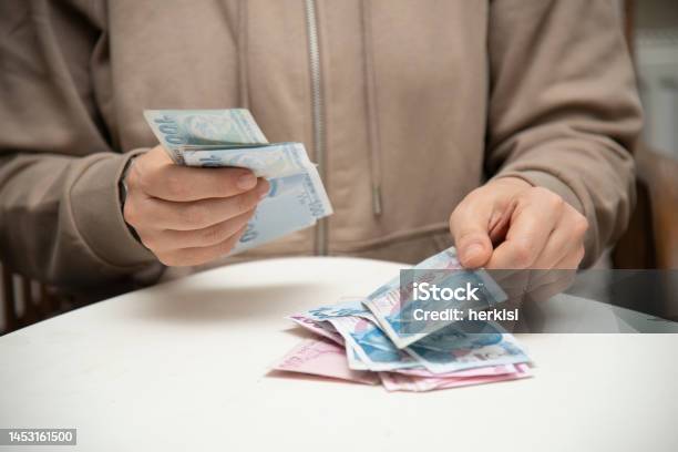 Hands Are Counting Turkish Banknotes Stock Photo - Download Image Now - Financial Bill, Paying, Wages