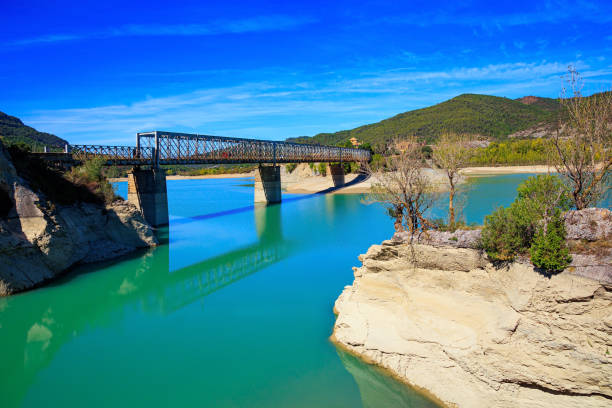 istock Picturesque backwater and bridge 1453163411