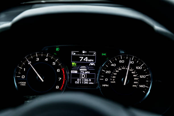 Speeding Car Dashboard Speedometer Display Close-Up stock photo