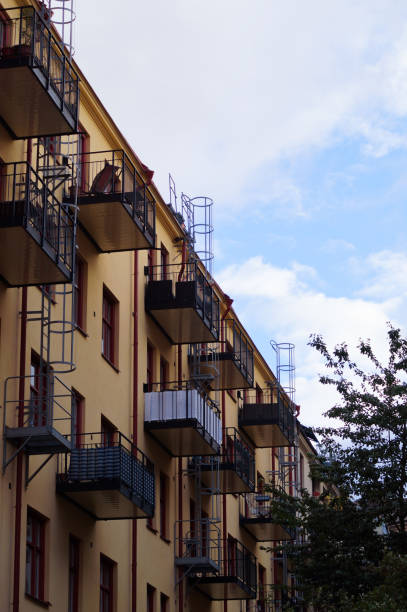 istock Low angle view of residential building against sky 1453164841