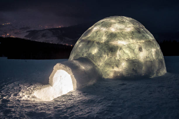 istock Fantastic winter landscape with glowing igloo in winter Carpathian mountains 1453166506