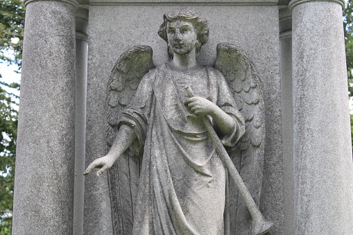 Angel Statue On A Cemetery Monument