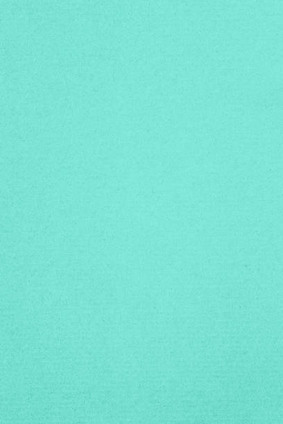 istock Vertical seafoam green macro kraft paper texture 1453168927