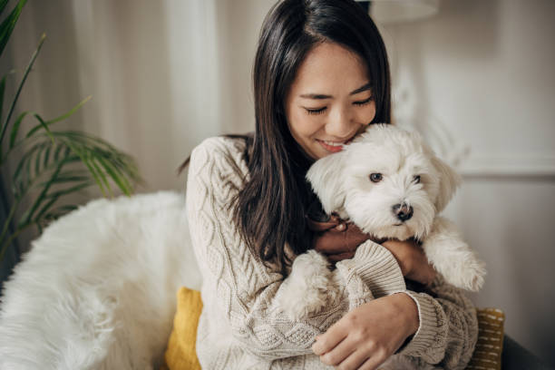 Woman hugging her dog