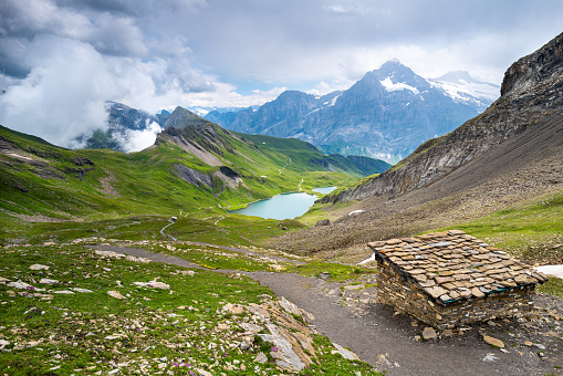 Hiking trail leading to the Bachalpsee in the Alps near Grindelwald, Switzerland.