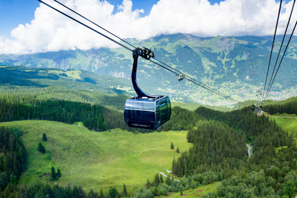 Grindelwald, Switzerland - June 29, 2022: The Eiger Express tricable car Gondola will take you from Grindelwald to the Eiger Glacier station in just 15 minutes.