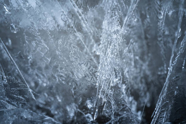 istock figures made of fragile transparent ice. concept: fragile, sharp, freezing 1453178878