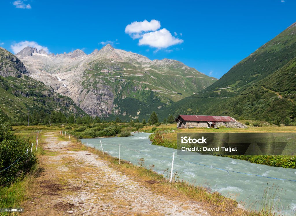 River Rhone and Rhone glacier River Rhone and a view at the Rhone glacier from village Gletsch in Switzerland Beauty Stock Photo