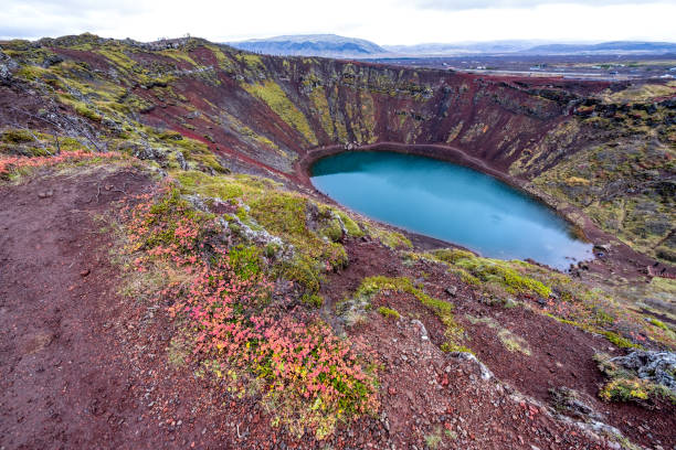 Just off the rim road an hour or so west of Reykjavic is this magnificant remnant of violent geological activity eons ago. Notice the dots on the rim. Those are people.