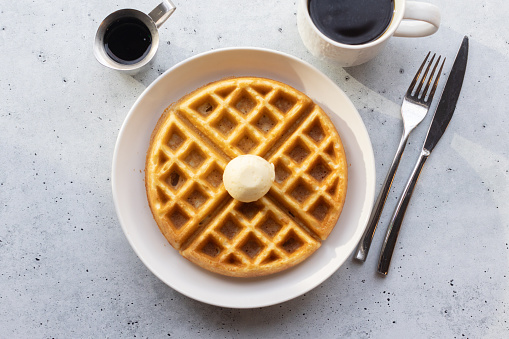 Waffle straight down with coffee, syrup