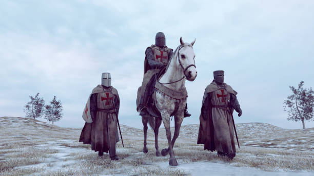 Soldier wearing armor on a journey in medieval times Soldiers from medieval times walks next to each other. They wear armor and helmets. One of them rides a horse. knights templar stock pictures, royalty-free photos & images