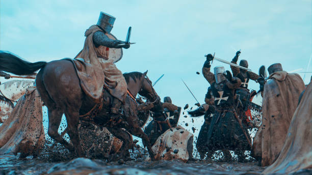 istock Medieval soldier on war horse attacks enemy with a sword 1453202698