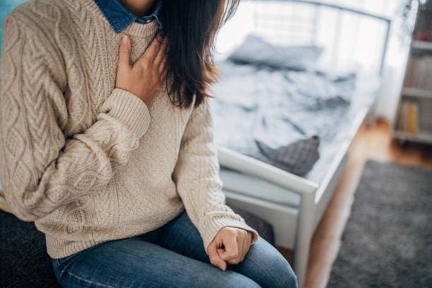 istock Woman having chest pain 1453203844