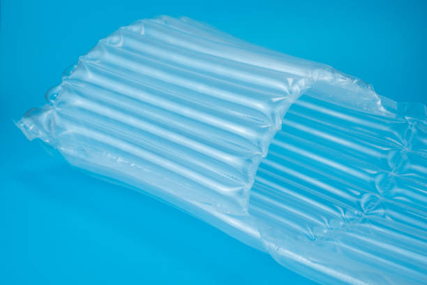 istock Plastic inflatable air shockproof packaging on blue background,Express protection concept 1453207811