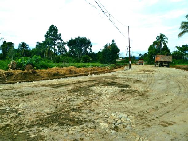 istock construction of road widening in Nabire Papua 1453208675