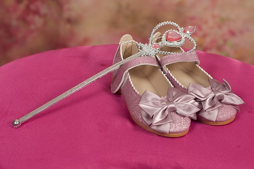 Photo of girls shoes and magical wand
