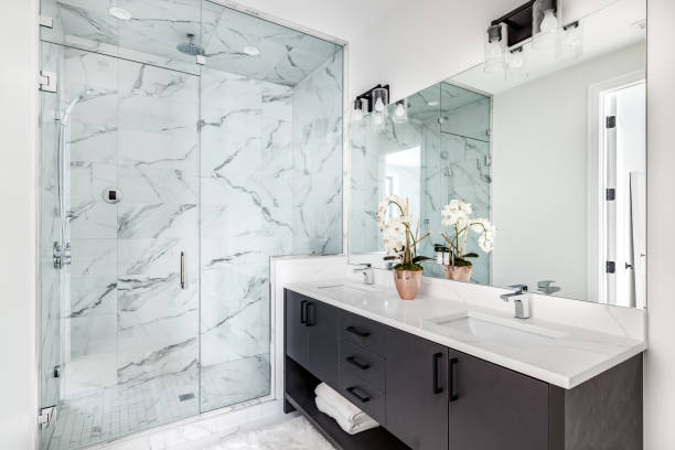 istock A modern bathroom with a grey cabinet and marble shower. 1453224567