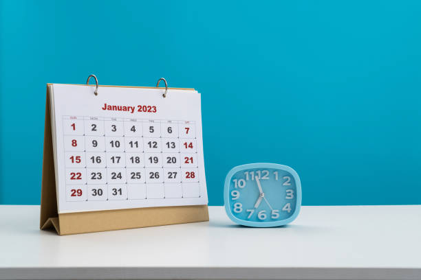 istock 2023 calendar and clock on the table 1453229877