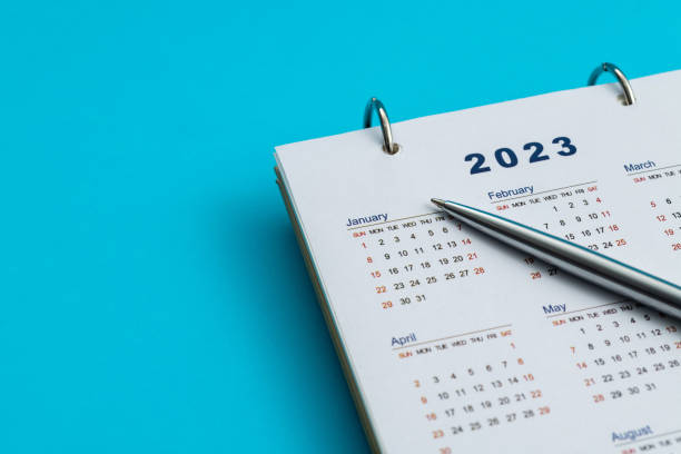 istock 2023 Calendar page with a pen 1453229895