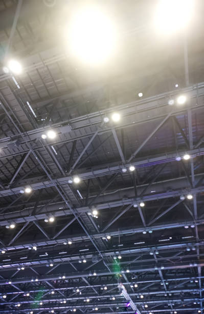 istock Ceiling light bulb in the exhibition hall, Architecture background 1453232837