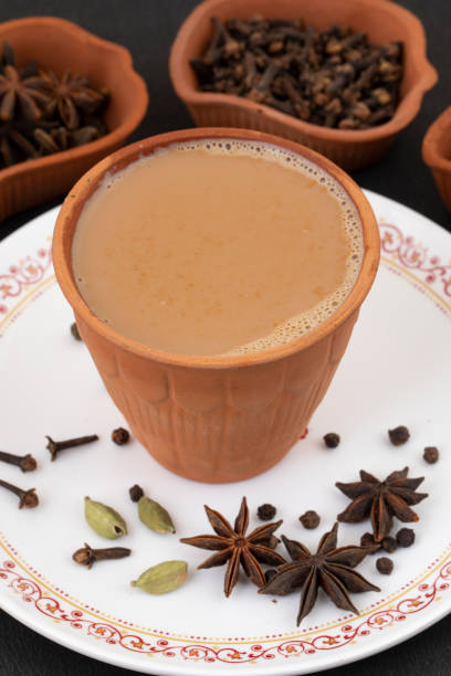 istock Indian Popular Drink Masala Chai or Masala on Black Background 1453245800