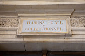 tribunal civil et correctionnel text on ancient wall facade building means in french courthouse civil and criminal court