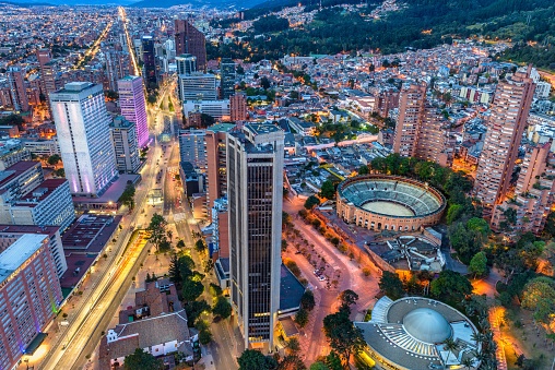 Vista aérea del paisaje urbano moderno de Bogotá en Colombia por la tarde photo