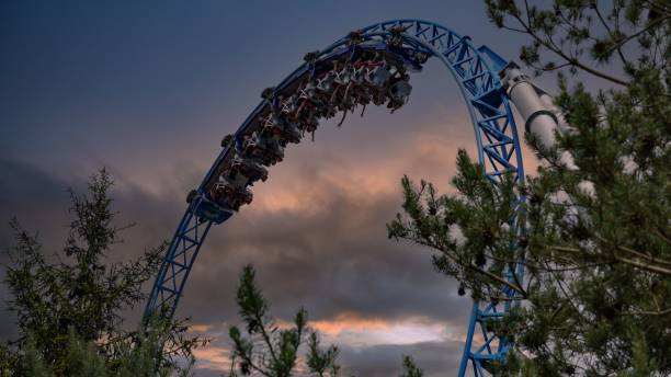 young people screaming during a ride at europa park roller coaster "bluefire" - rust metal imagens e fotografias de stock