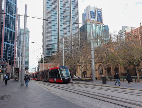 Sydney, Australia – August 28, 2022: A street with Toursitis in Sydney Queen Victoria Buil near Sydney Harbour