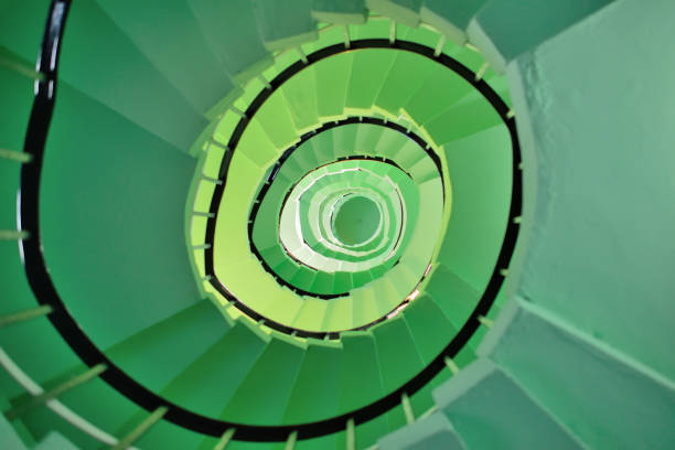istock Spiral green staircase in a lighthouse. 1453259915