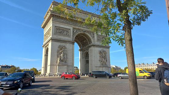 Champs-Élysées, Paris, France - October 7, 2022: Exterior details of Arc De Triomphe.
