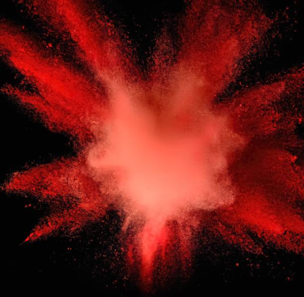 istock Vivid red color splash against a black background - perfect for wallpapers 1453265565