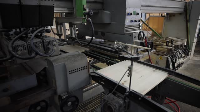 Interior of a wood slat factory with various tools for the production of wooden products