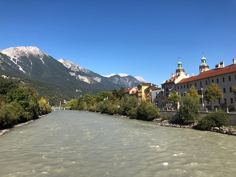 Innsbruck Tirol Austria oldtown in the alps - the river Inn and the dome roof  Dom zu St. Jakob