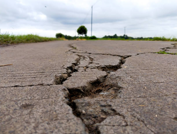 istock Close-up of broken street 1453272810