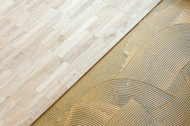 istock pattern of glue for fixing the parquet 1453273346