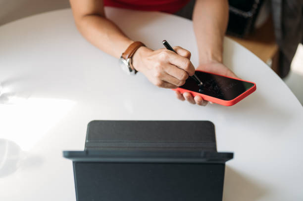 istock Tracking important appointment on smartphone and memorandum or daily note 1453276414