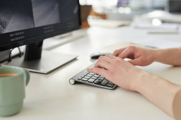 istock Close up young woman typing on keyboard 1453276447