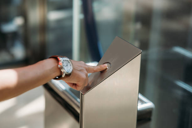 istock Close-up of female hand pushing elevator button 1453276592