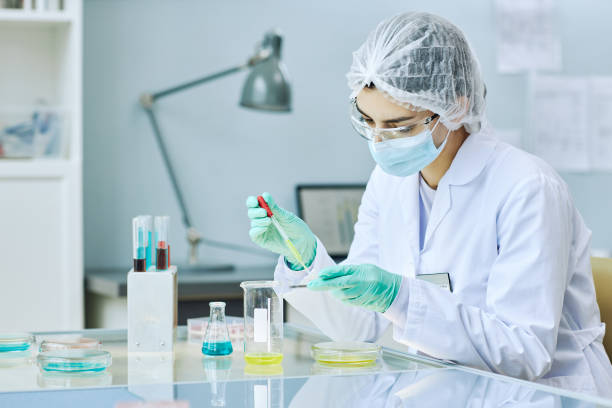 istock young woman working in laboratory doing experiments in petri dish 1453276910