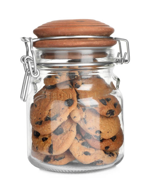 istock Jar of chocolate chip cookies isolated on white 1453277591