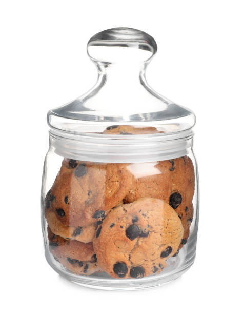 istock Jar of chocolate chip cookies isolated on white 1453279096