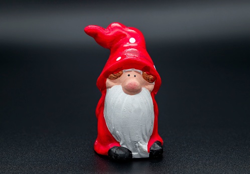 A closeup shot of Santa Claus isolated on a black background