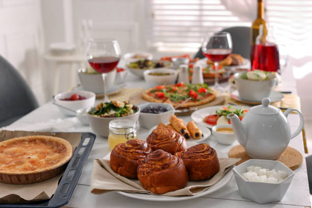istock Delicious buns and many different dishes served on buffet table for brunch 1453279925