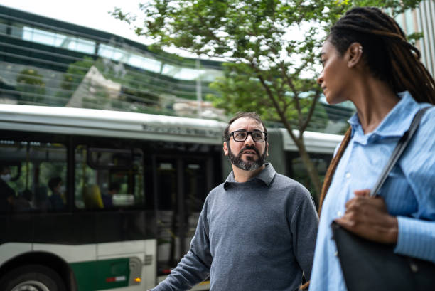 istock Colleagues walking and talking in a financial district 1453282812