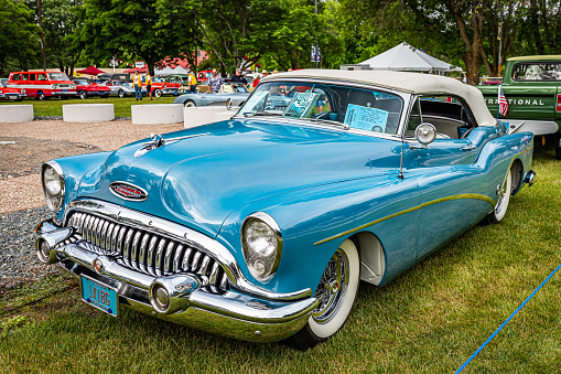Iola, WI - July 07, 2022: High perspective front corner view of a 1953 Buick Skylark Convertible at a local car show.