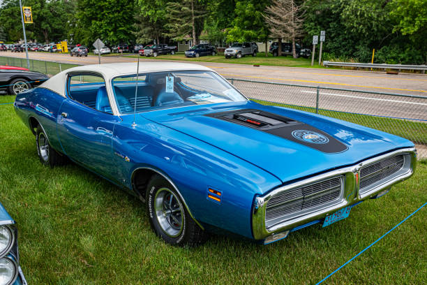 1971 Dodge Charger Super Bee Iola, WI - July 07, 2022: High perspective front corner view of a 1971 Dodge Charger Super Bee at a local car show. dodge charger stock pictures, royalty-free photos & images