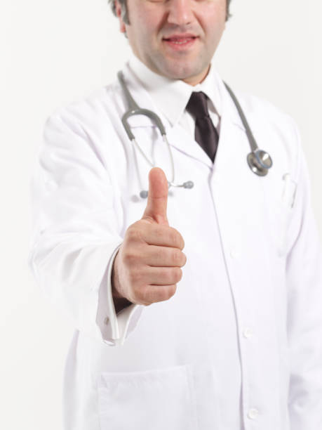 istock Doctor holding his thumb up 1453289696